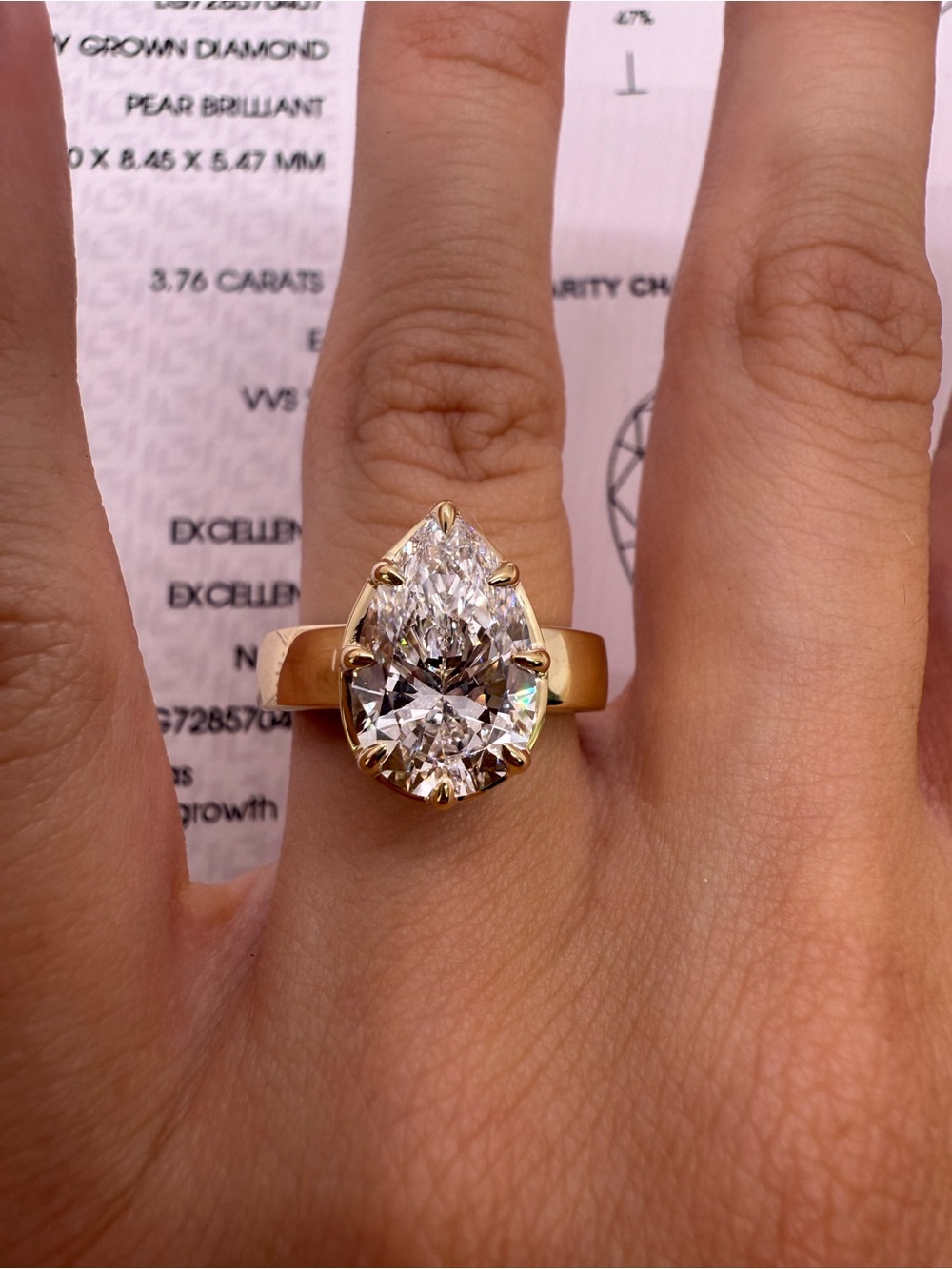 3.57 carat E VVS2 chubby pear on a wide band diamond engagement ring - Picture 10 of 14